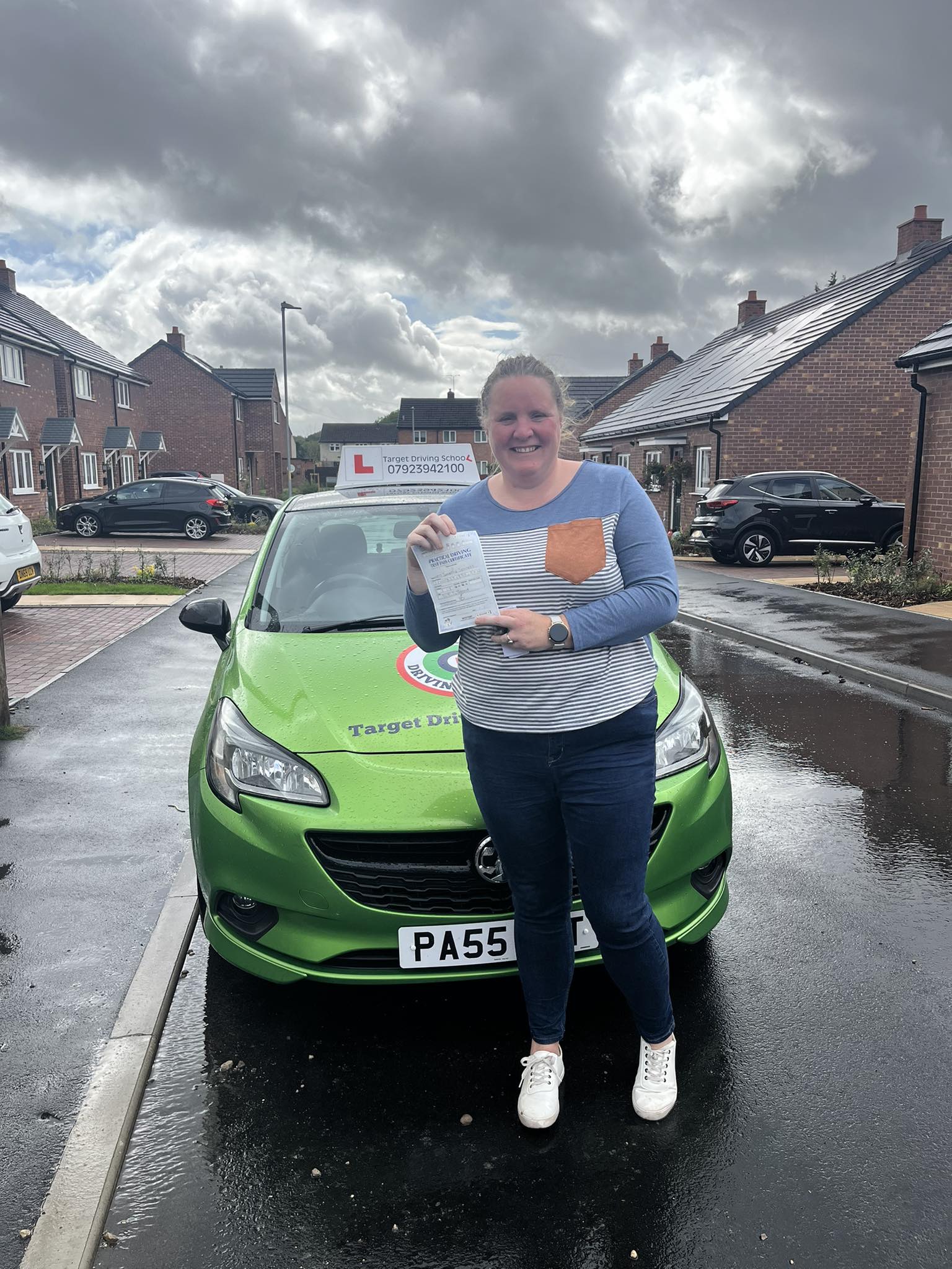 Student celebrating practical driving test pass with Target Driving School Telford